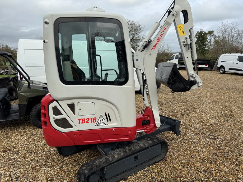 View FORD TRANSIT Takeuchi TB216 Digger