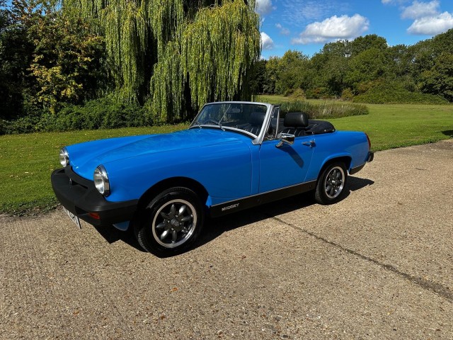 MG